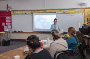 Flor presents at Cafe con Flor